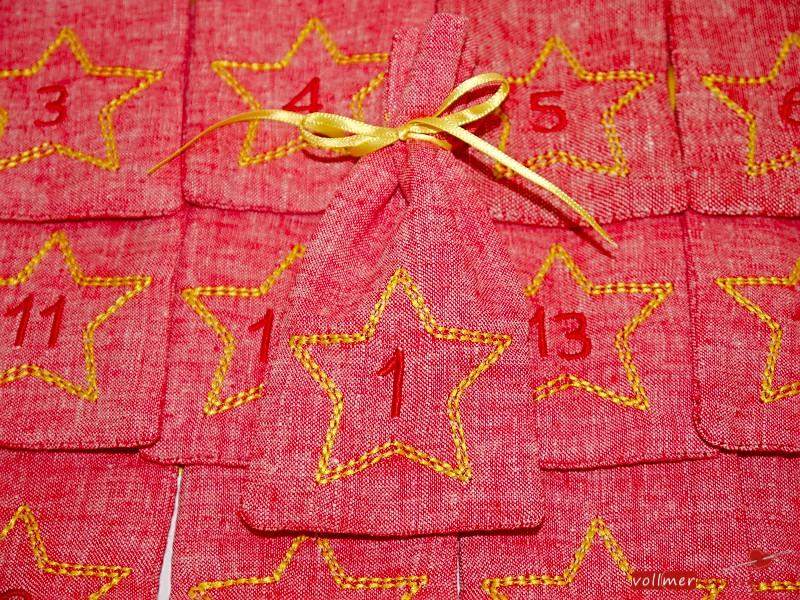 Adventskalender aus Stoff zum Befüllen bestickt mit Stern und Zahl Leinenoptik edel